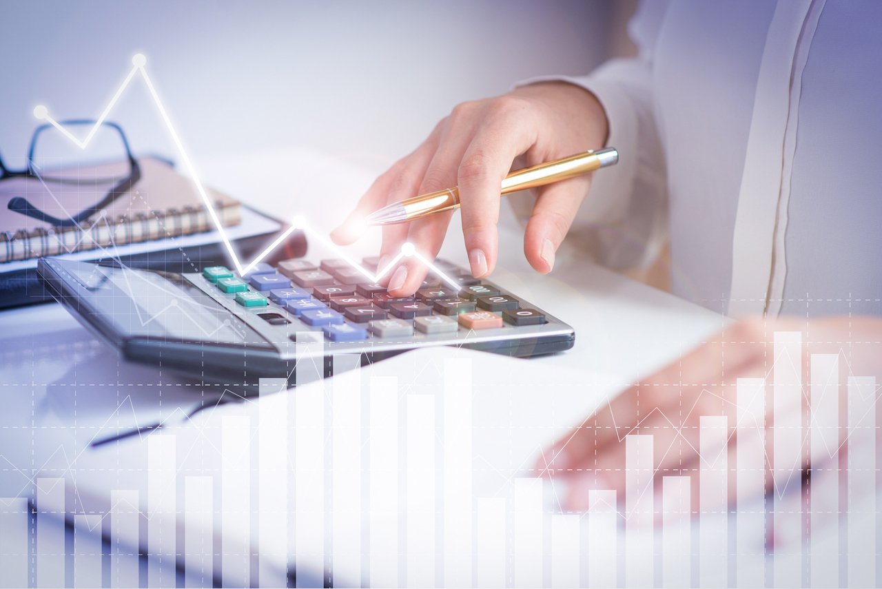 accountant-calculating-profit-with-financial-analysis-graphs_Easy-Resize.com